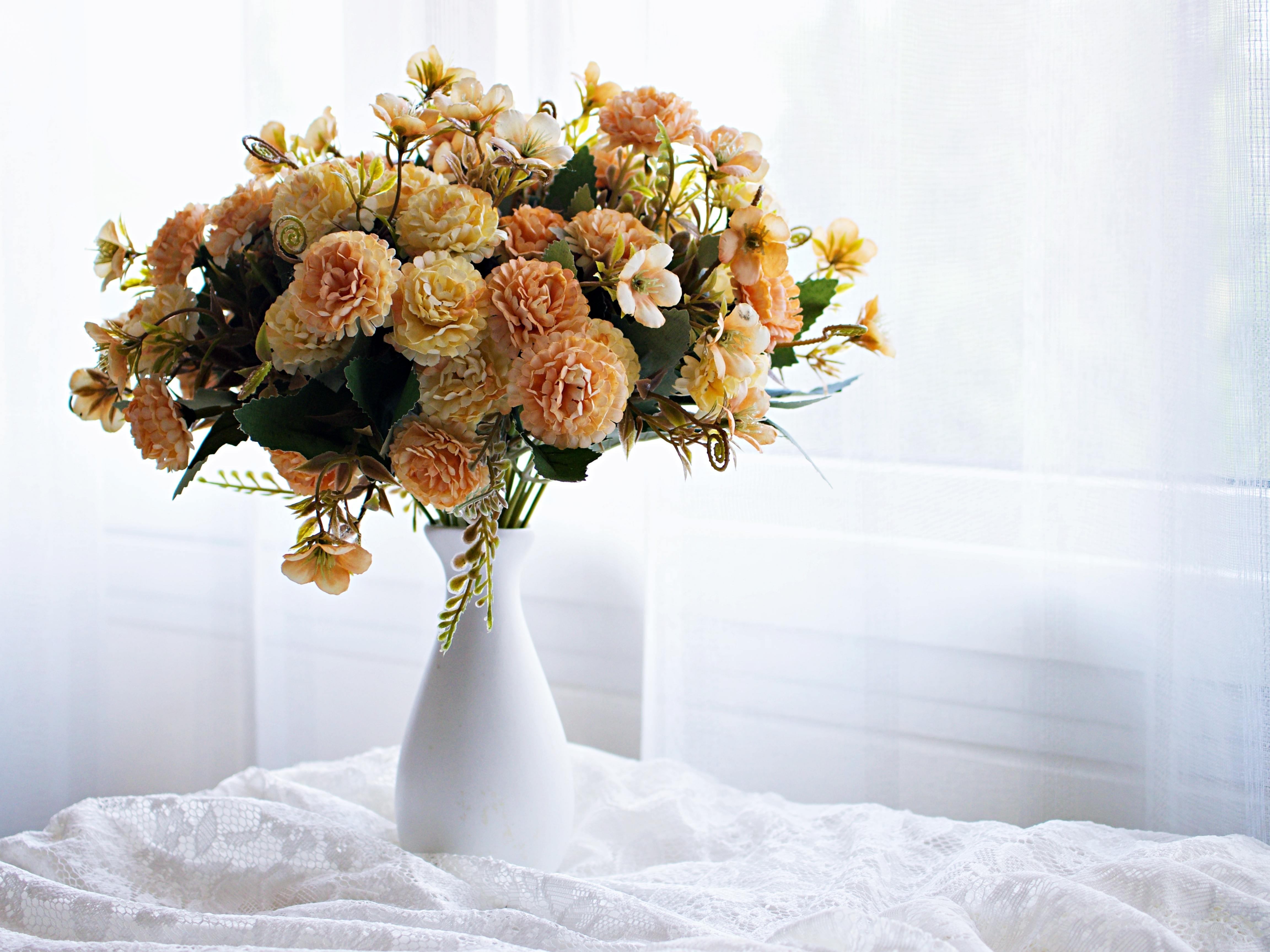 A bouquet in a beautiful vase makes a thoughtful self-care gift for a friend.