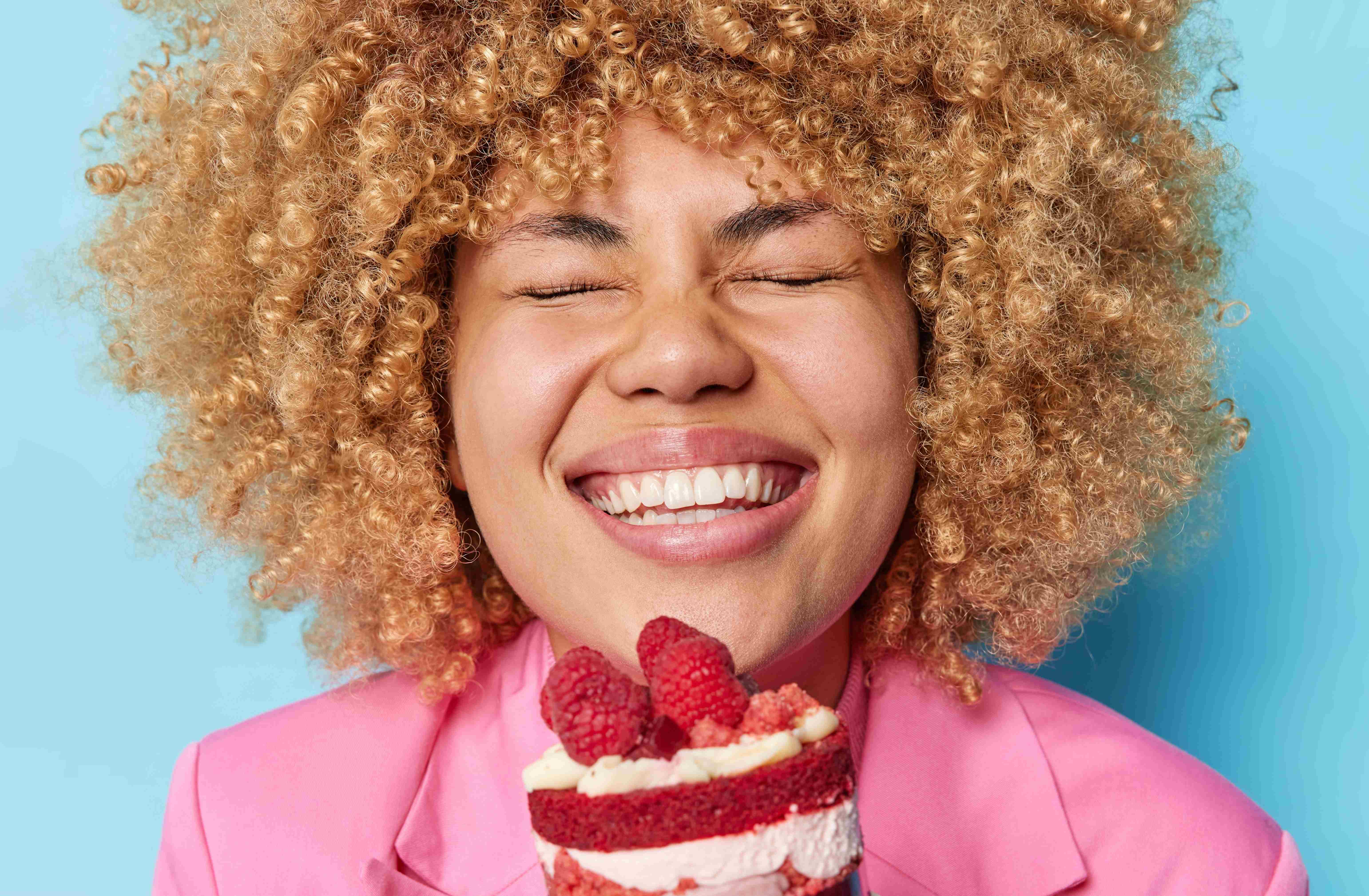 A Taurus woman is excited to enjoy a piece of cake just because.