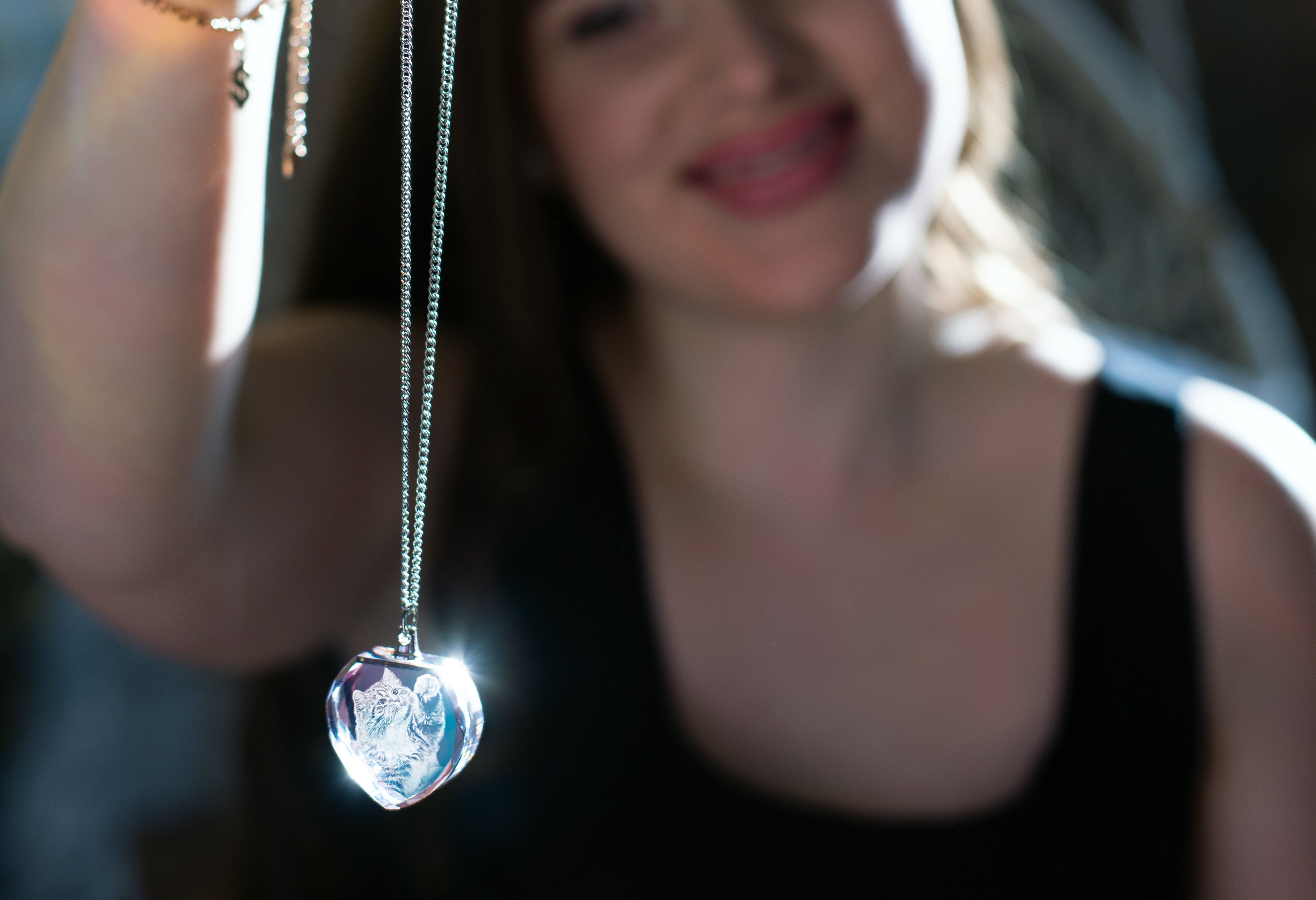 A personalized photo necklace makes a beautiful graduation gift. 