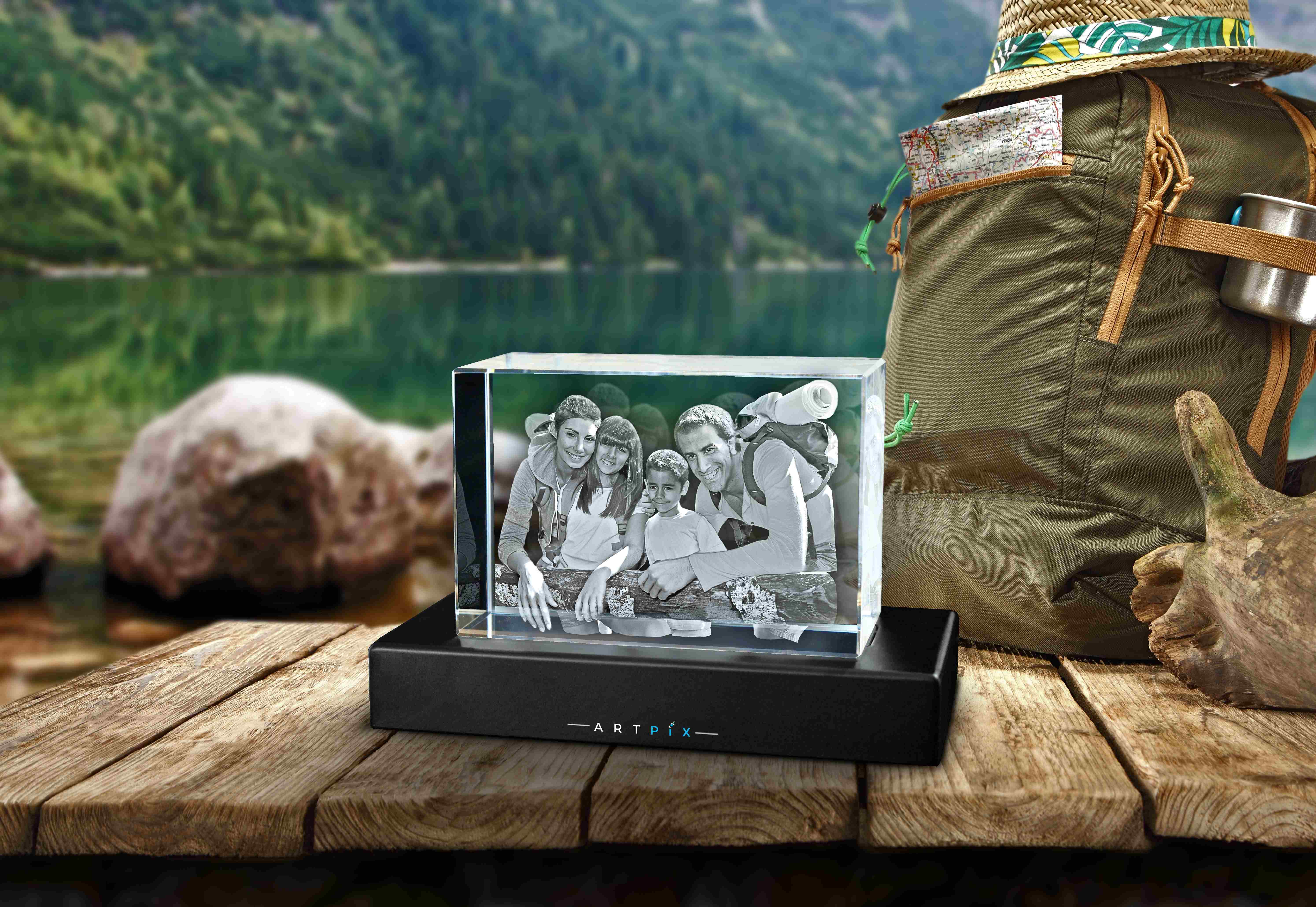 A sweet photo of a family on vacation engraved inside a 3D crystal gift.