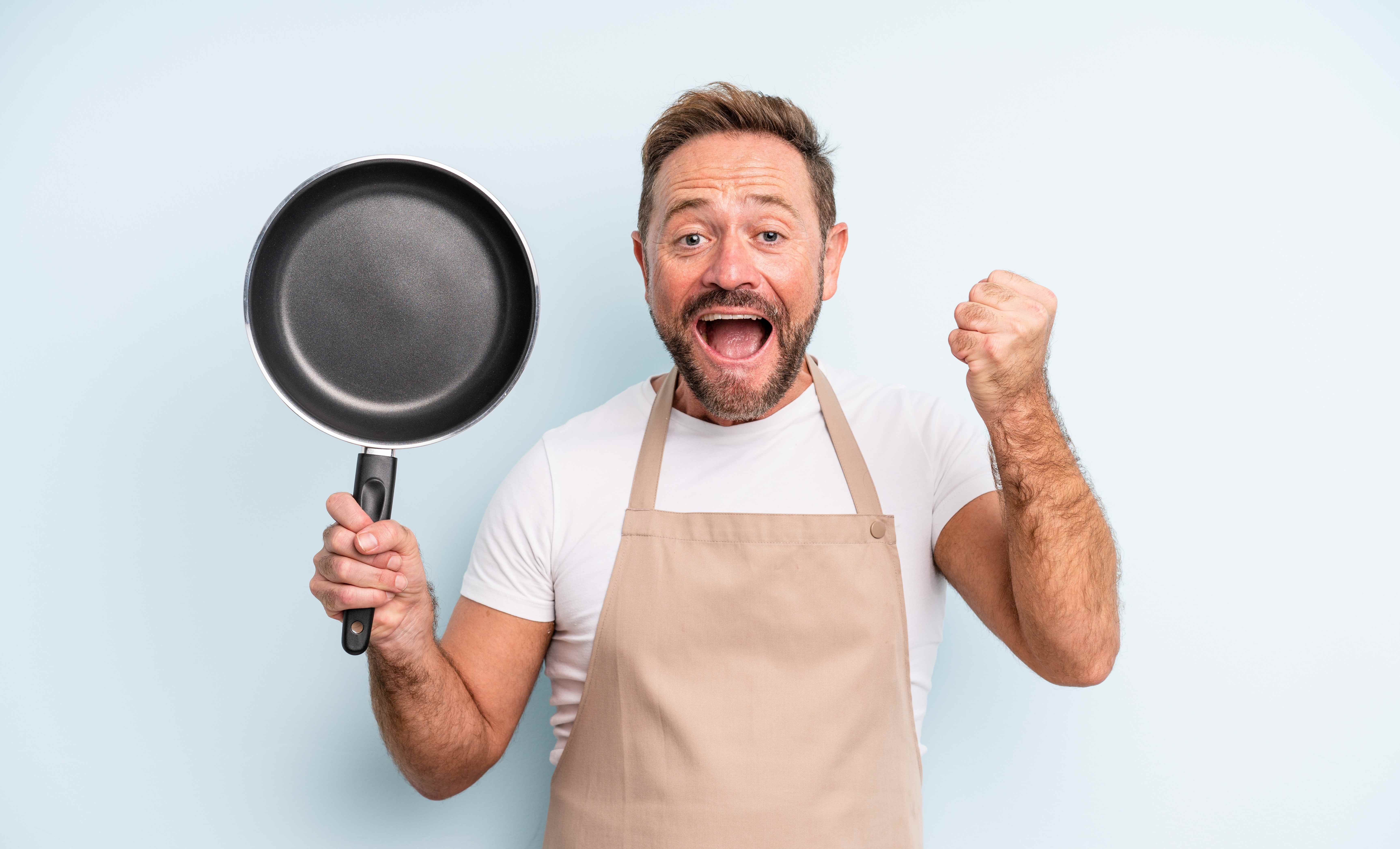 A dad who loves to cook receives a frying pan for Father’s Day. 