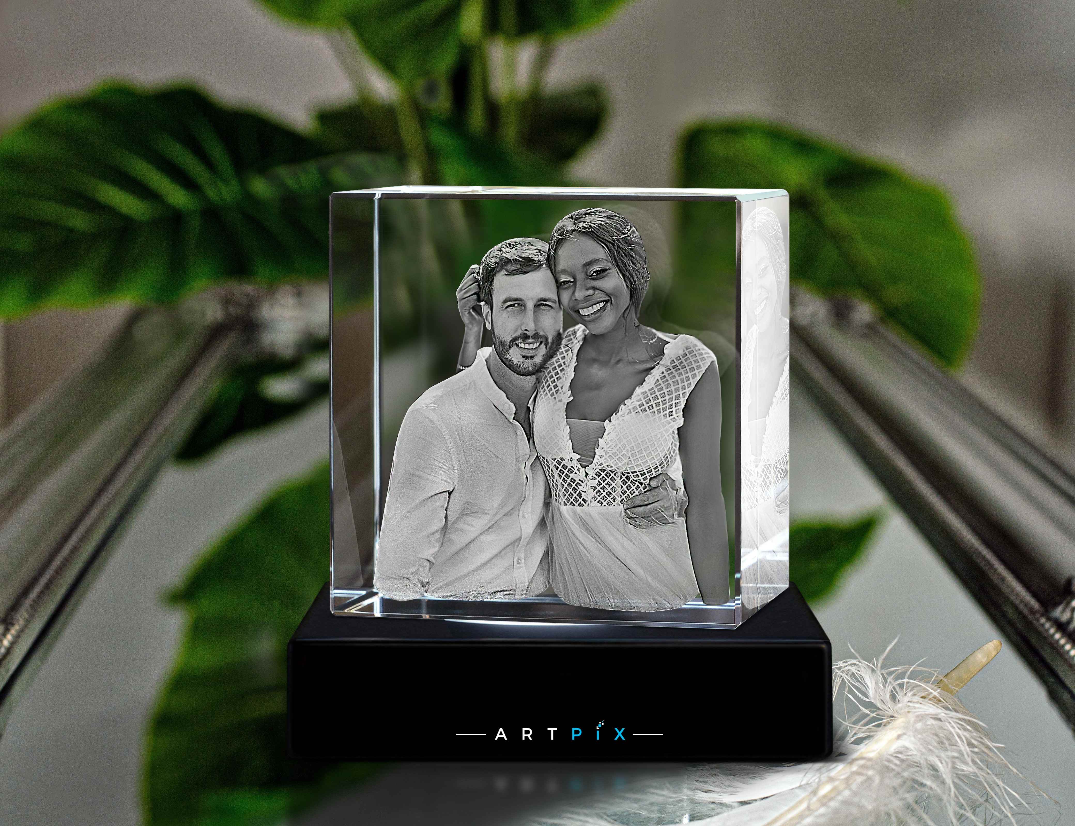 A photo of a happily married couple engraved in a 3D crystal to celebrate their baby shower