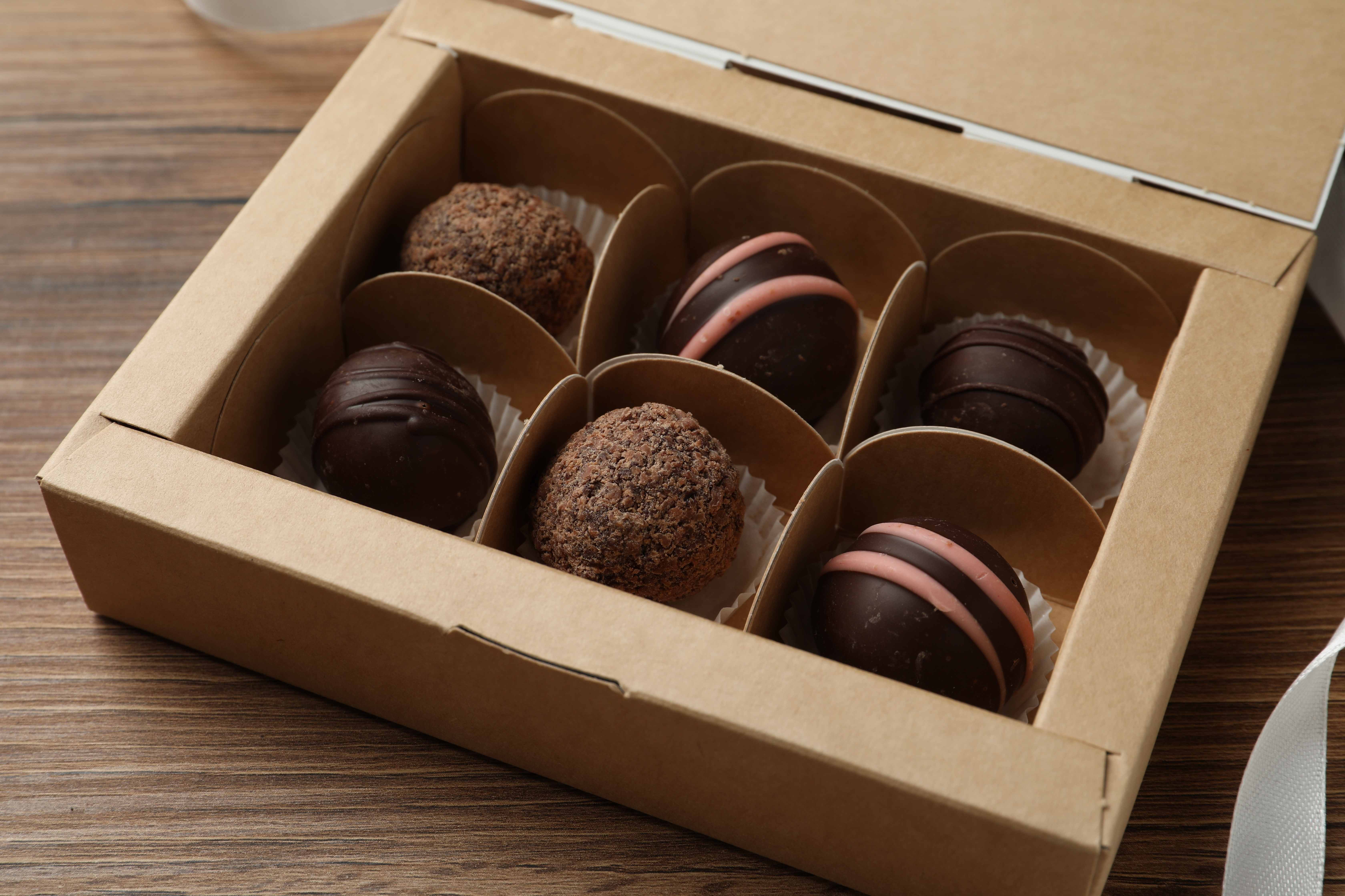 A box of delicious chocolate bon-bons makes a wonderful hostess gift.