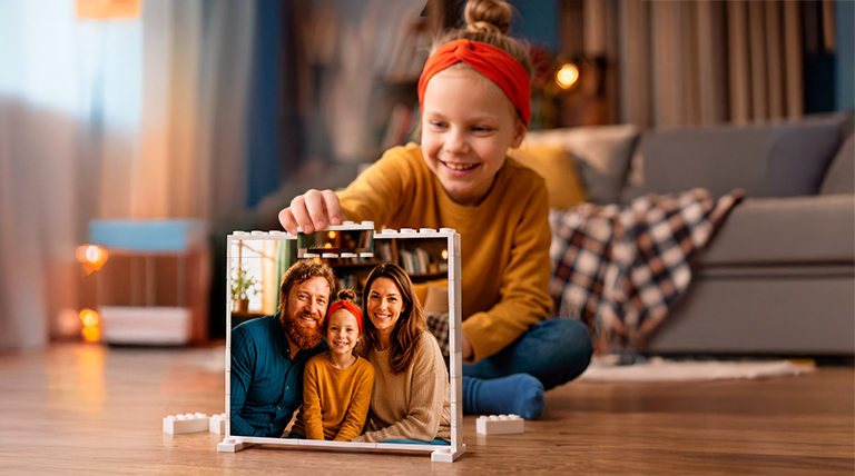 A girl finishing photo puzzle with a custom photo