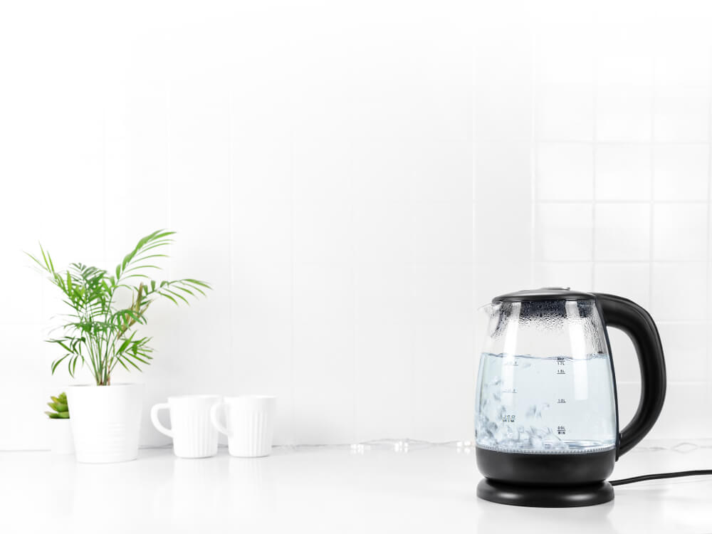 A countertop electric kettle makes it easy to boil water for tea.