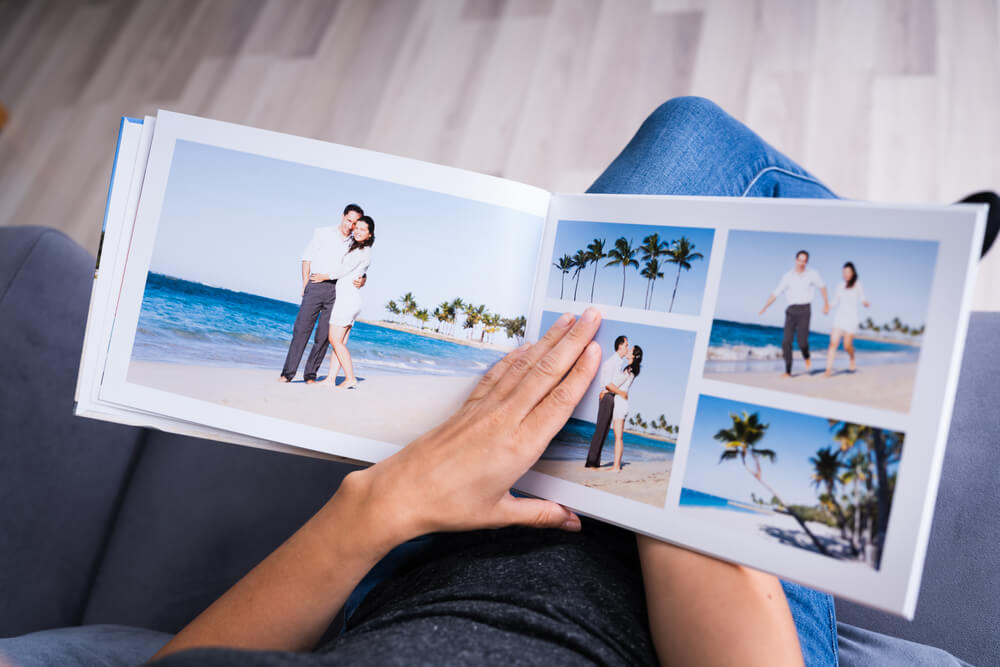 A photo scrapbook filled with a couple’s beautiful engagement pictures.