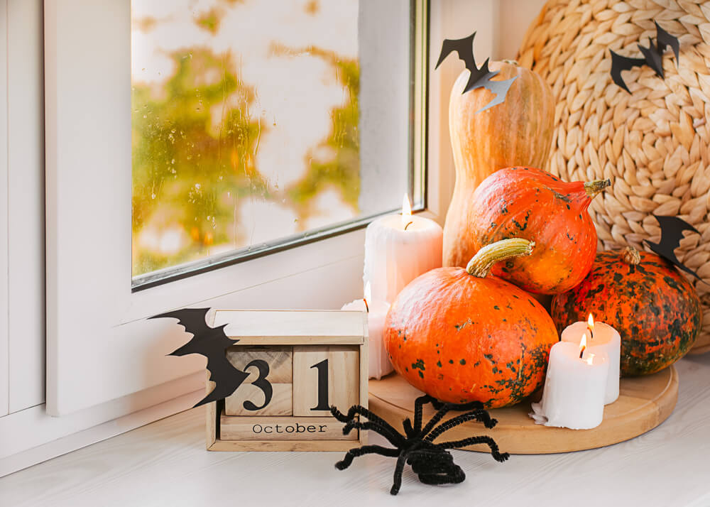 A cozy windowsill decorated with a cute Halloween countdown calendar.