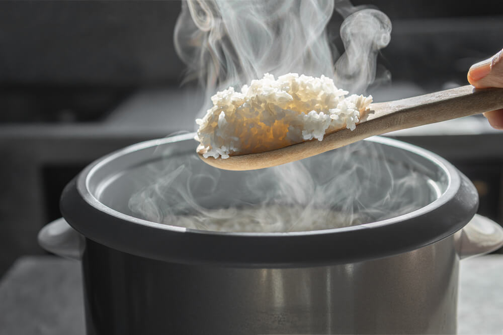A meticulous home chef uses the rice cooker they received as a birthday gift.