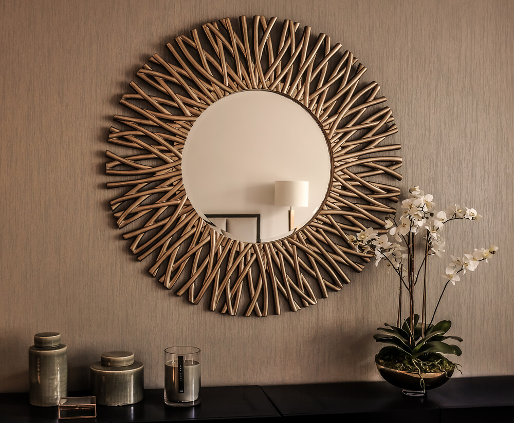 A sun-shaped mirror in a Leo’s bedroom to remind them of their zodiac sign.