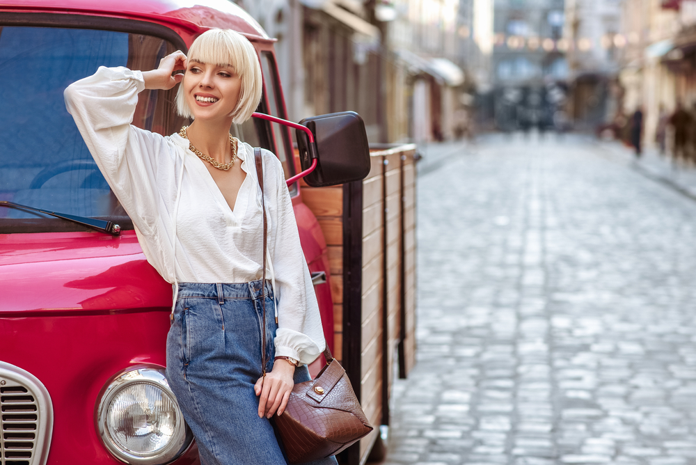 A stylish Cancer woman wears a new pair of jeans to go out.