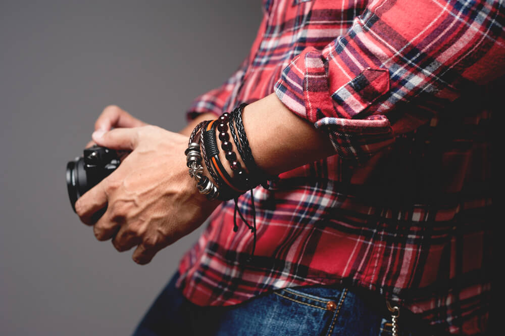 A stylish dad wears the bracelet his kids gave him as a Father’s Day gift.