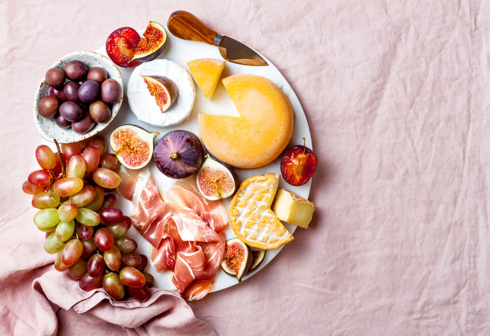 A delicious-looking charcuterie board makes a welcome addition to date night.