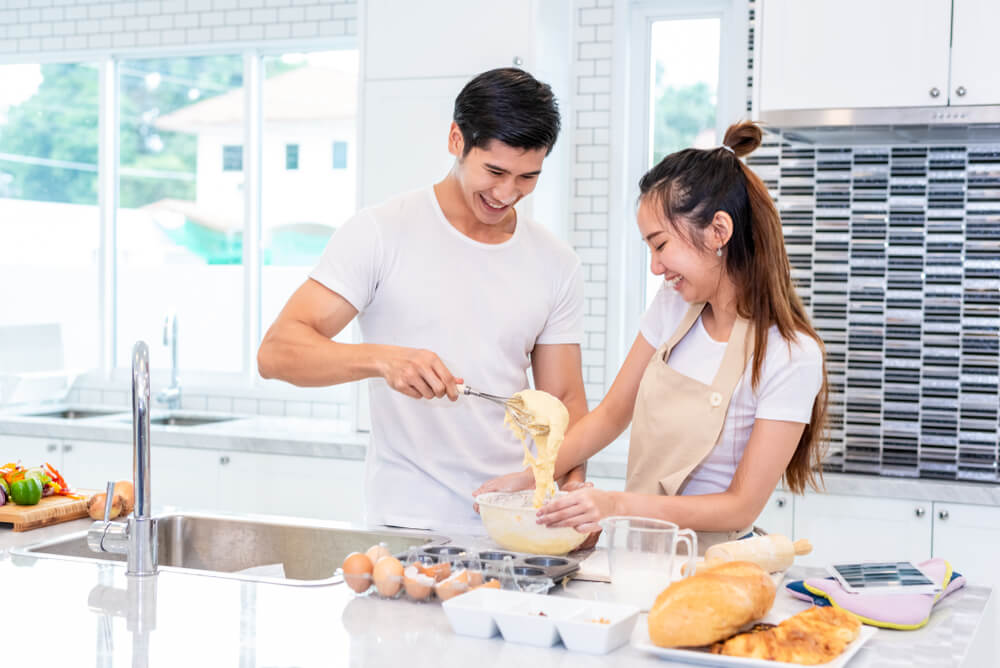 A married couple in love learns to bake pastries together on their anniversary.