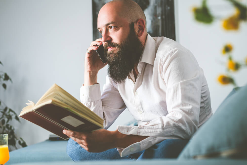 A book lover discusses their most recent read over the phone.