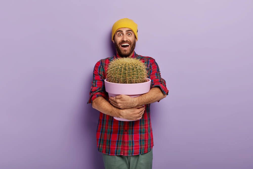 A man is excited to receive a cactus as a Father’s Day gift.