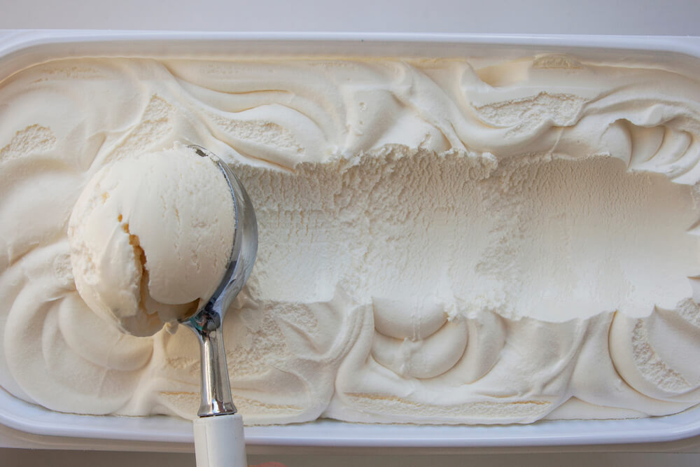 A delicious scoop of vanilla ice cream perfect for making a sundae.
