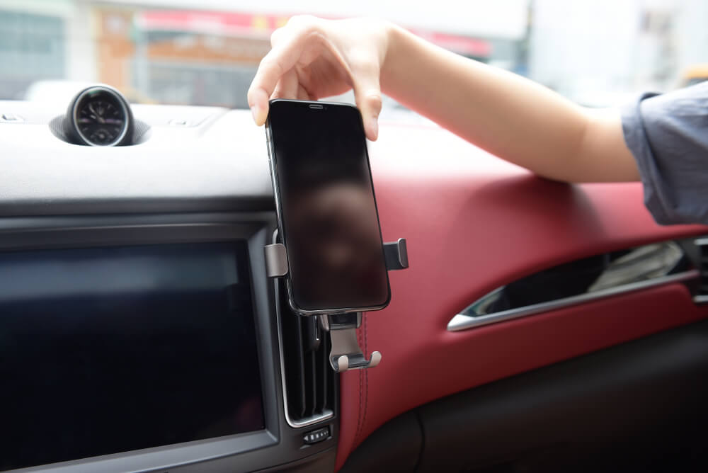 A car equipped with a convenient phone charging station.