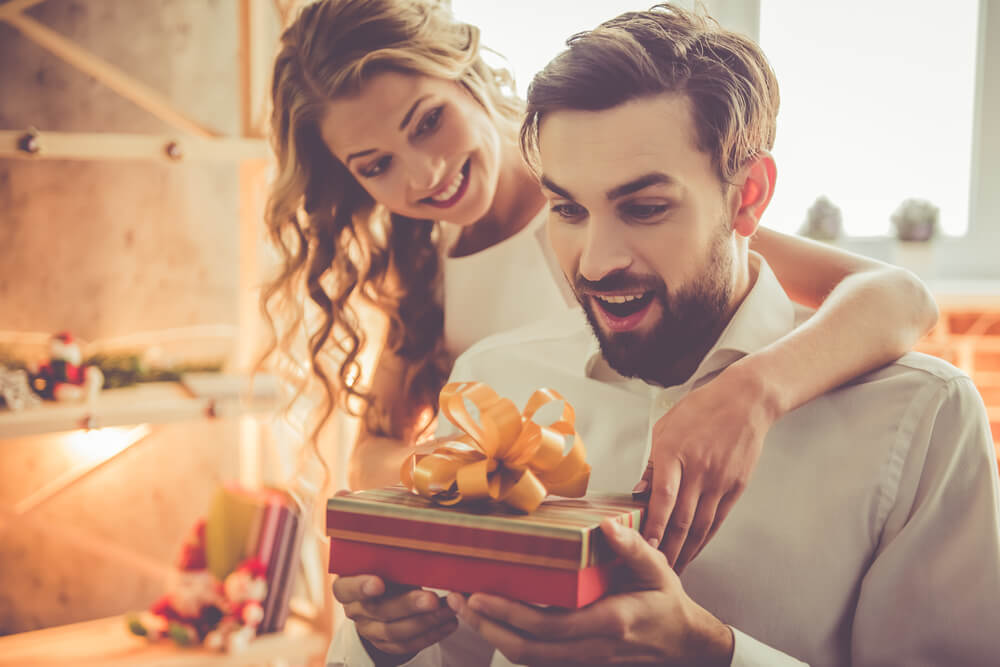 A loving girlfriend surprises her boyfriend with an awesome gift.