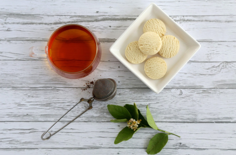 A hot cup of tea and a snack to lift someone’s spirits on a cold day.