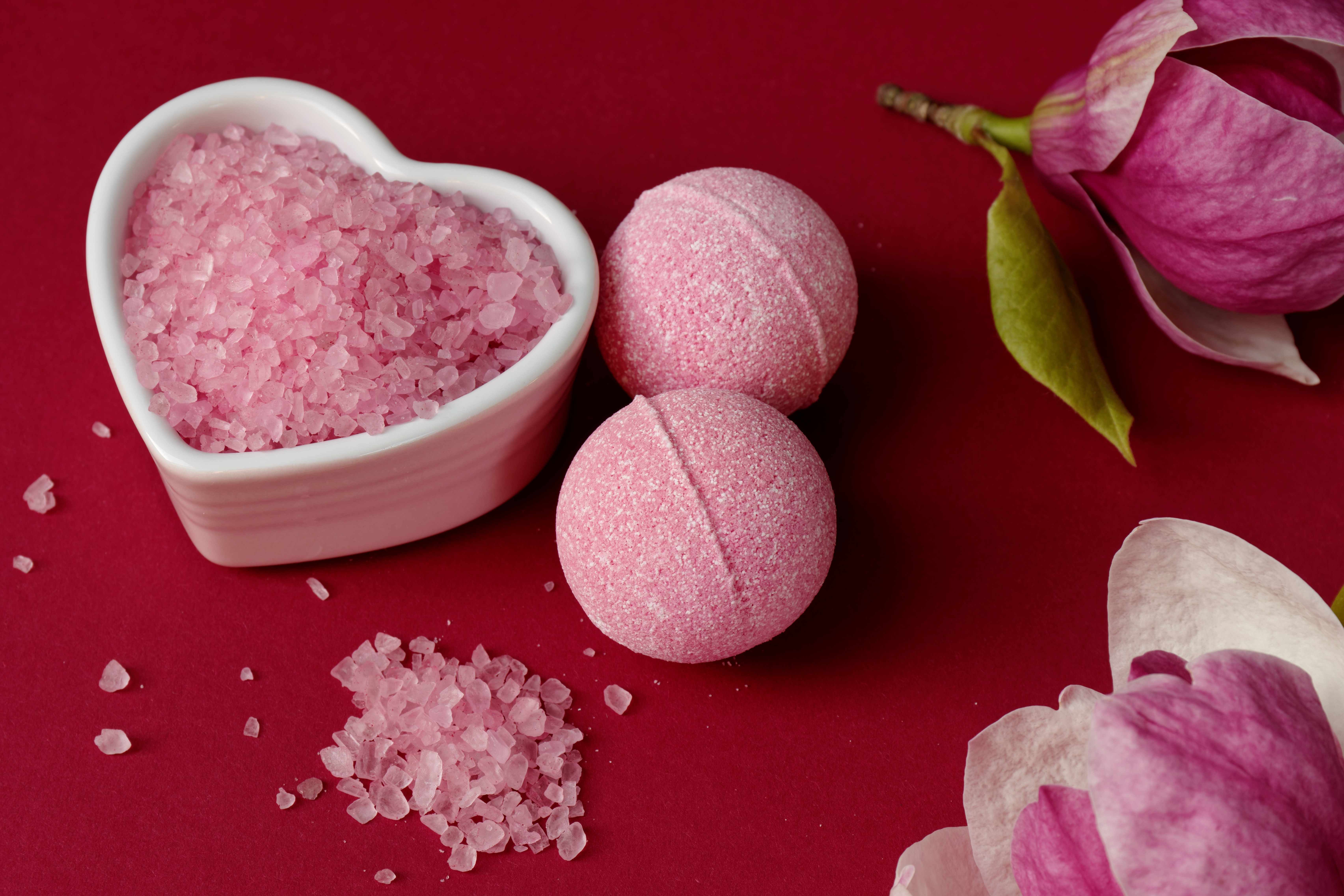 Pink bath bombs make romantic self-care gifts for Valentine’s Day.