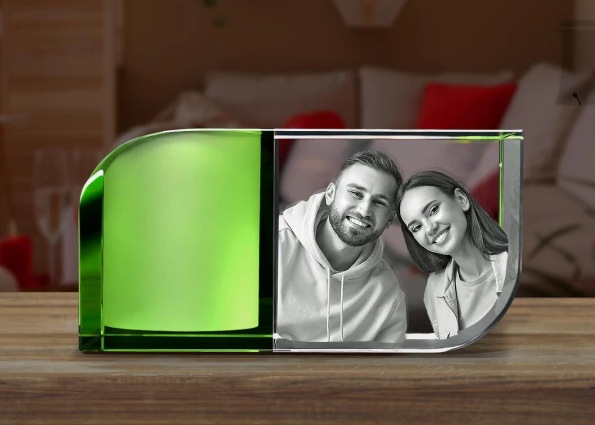 A 3D picture of a boyfriend and girlfriend engraved inside a Crystal Candle Holder.