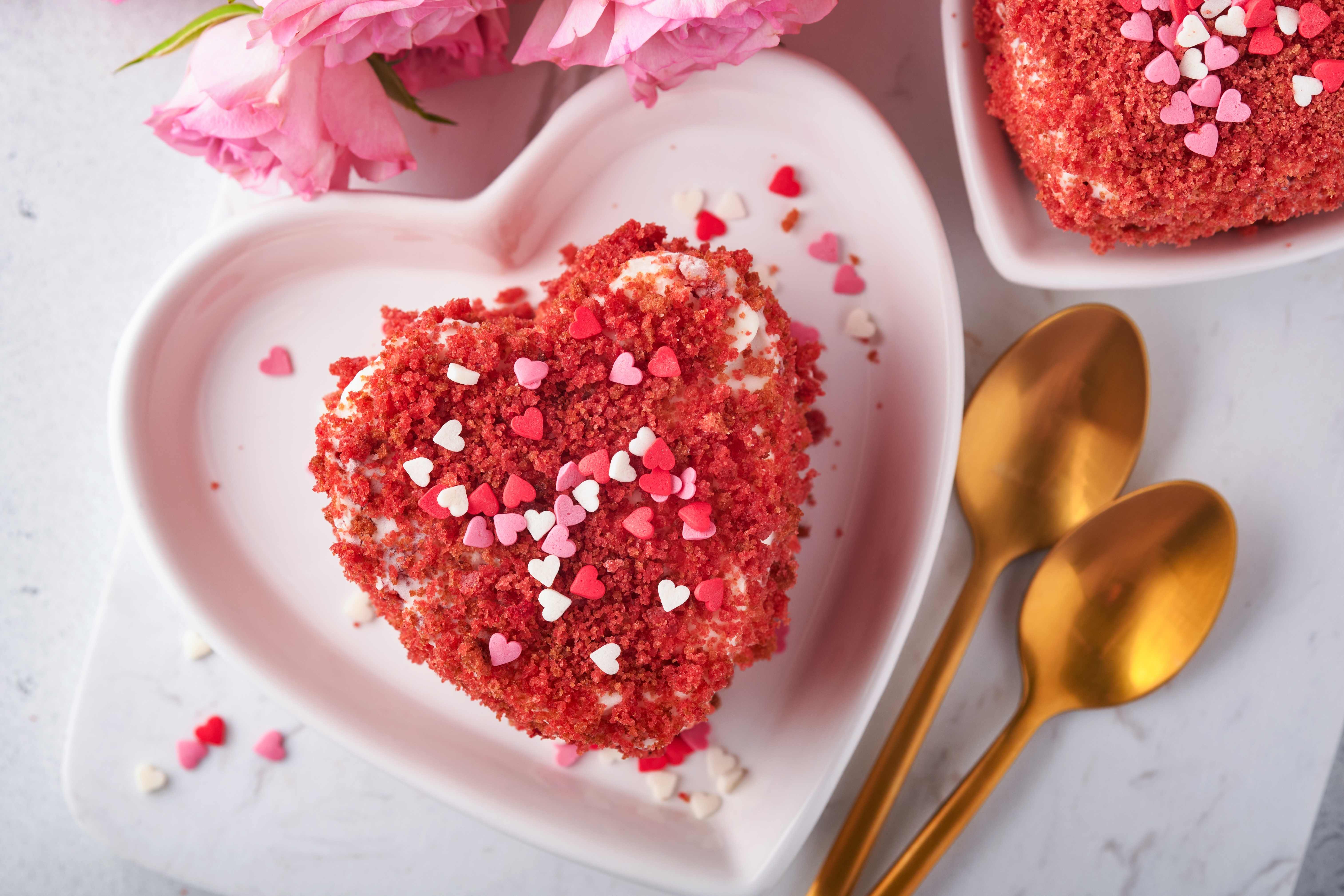 A home-baked, heart-shaped cake for your girlfriend on Valentine’s Day. 