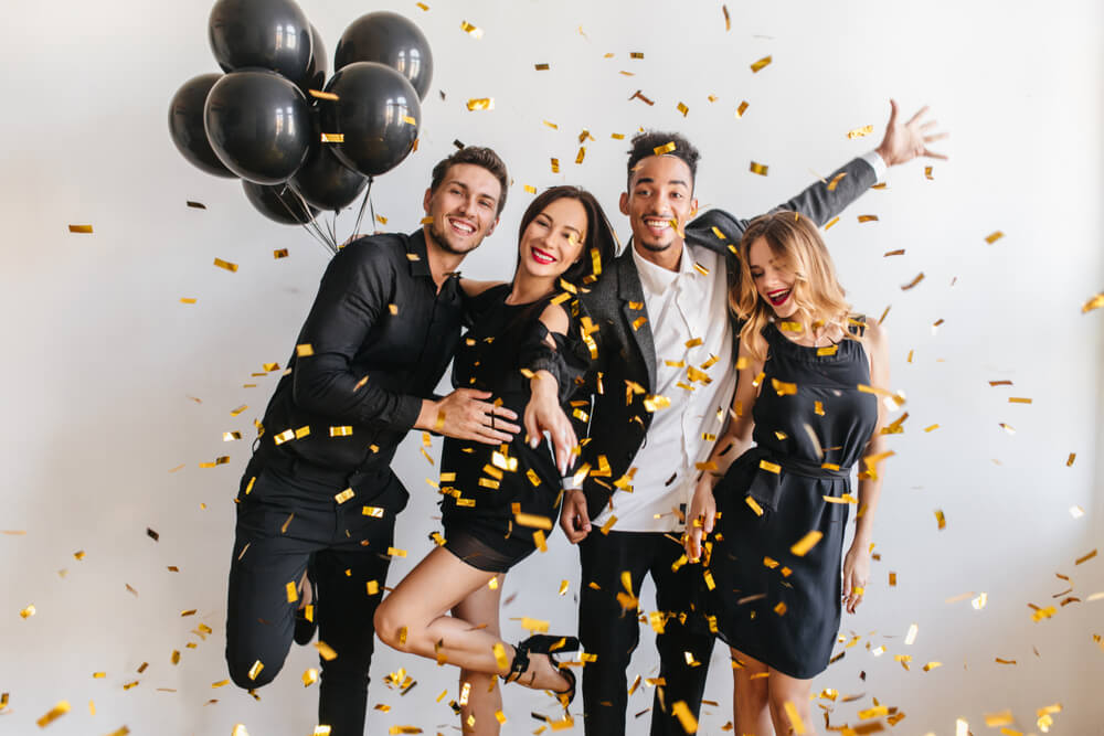 An elegant group of young people celebrates their Scorpio friend’s birthday.