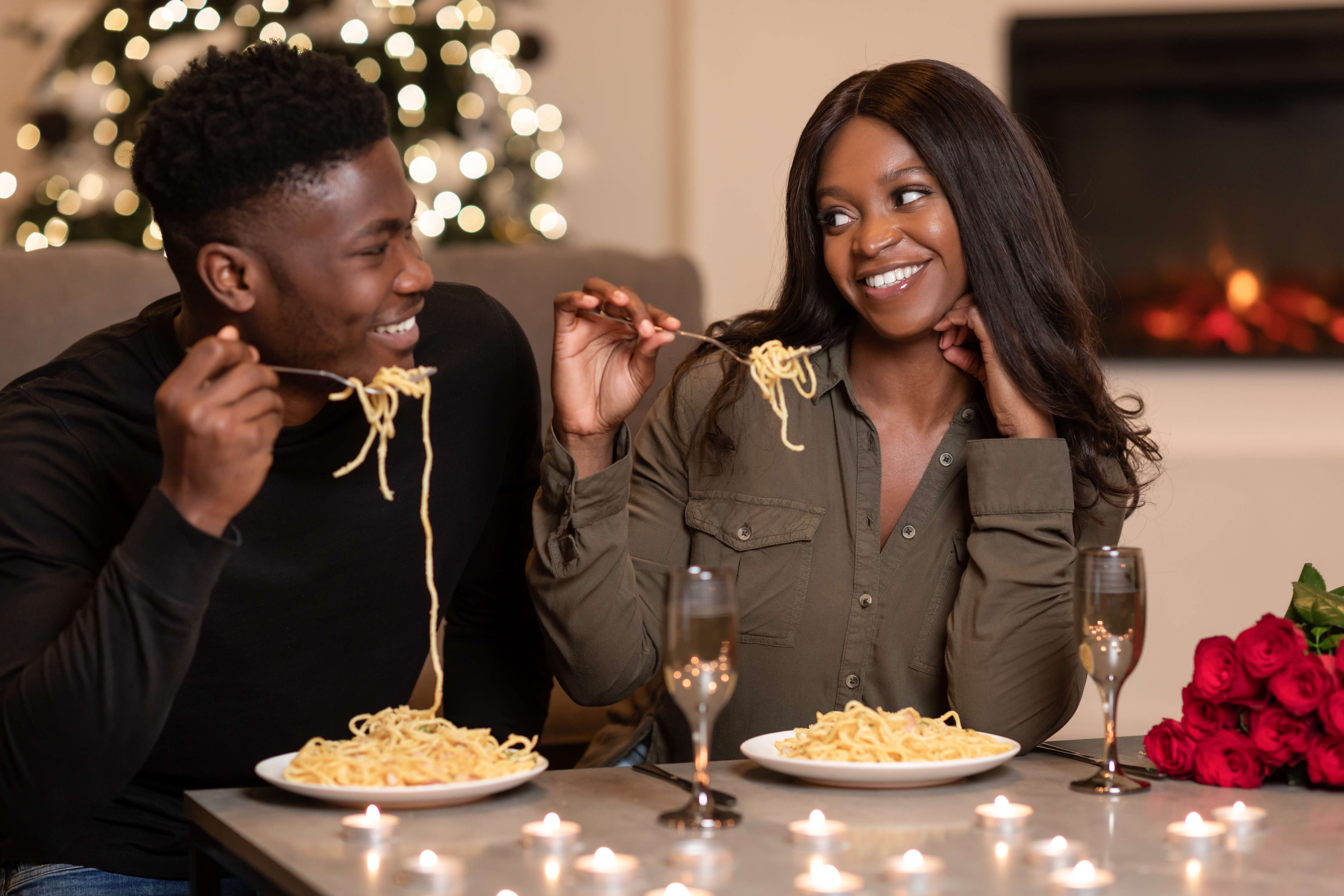 A sweet girlfriend treats her boyfriend to a romantic home-cooked meal.