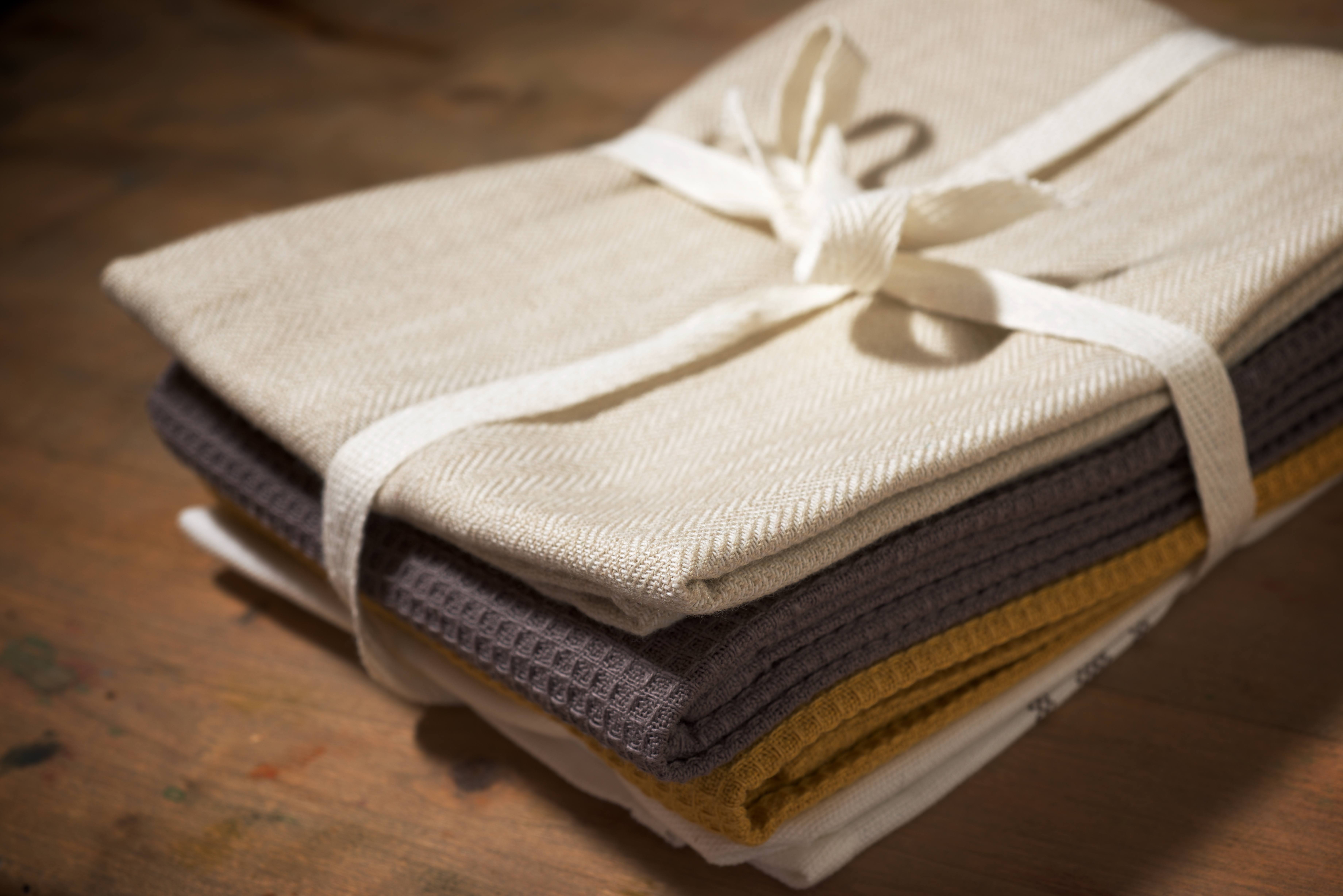 A gift set of stylish dish towels for the kitchen.
