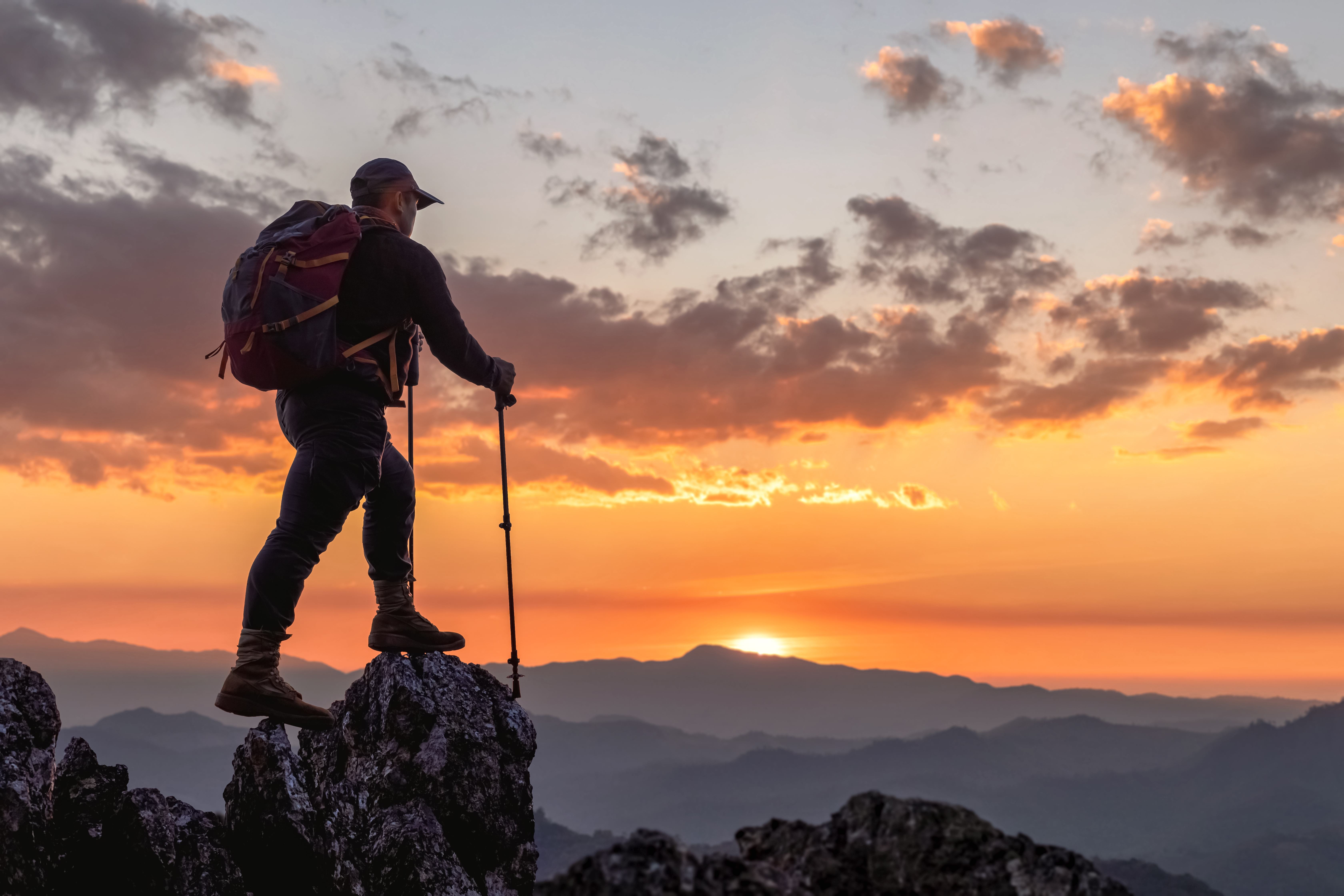 A nature-loving man enjoys a mountain hike for his birthday.