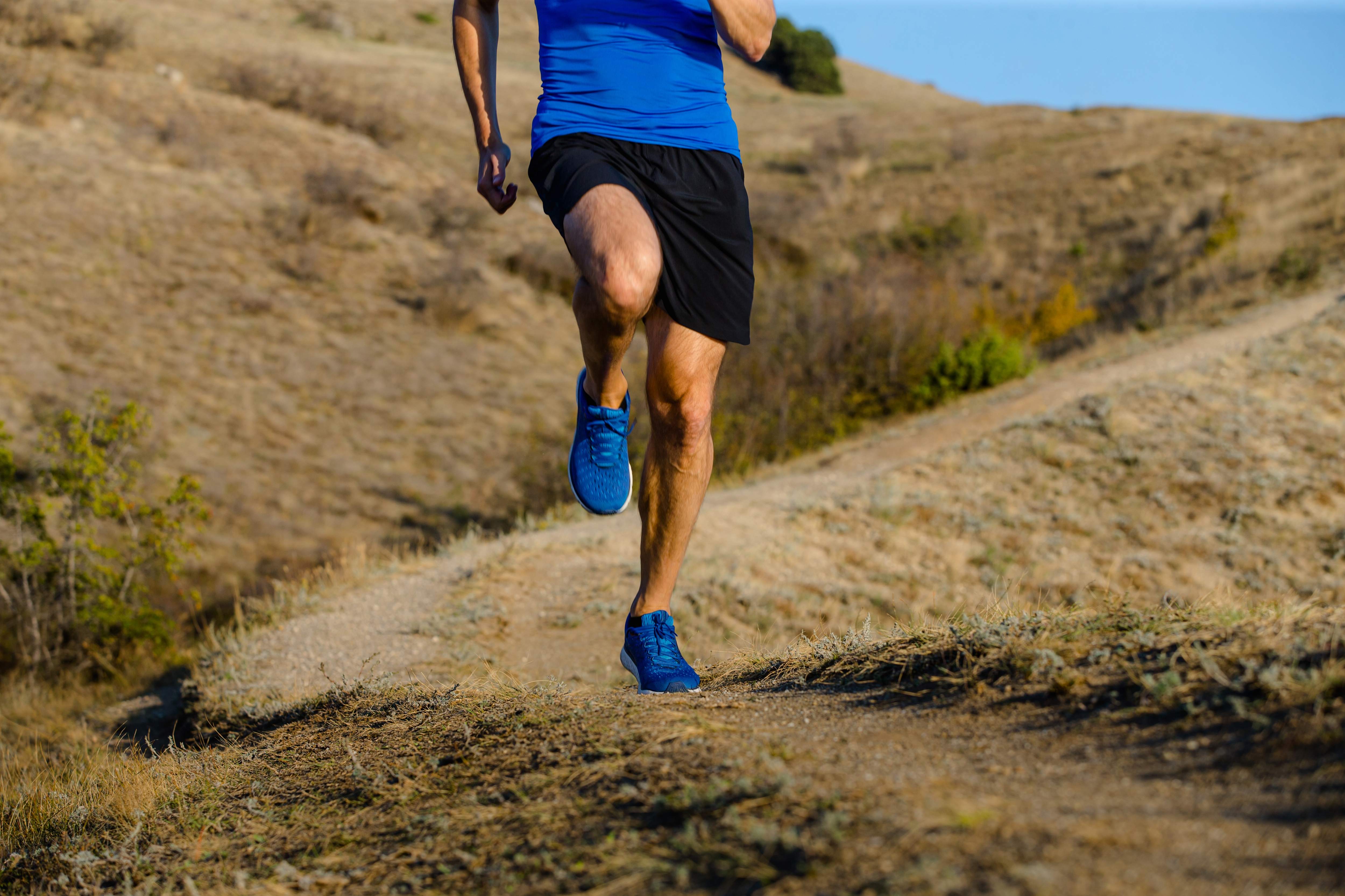 An energetic man goes for a jog in a new pair of sneakers.