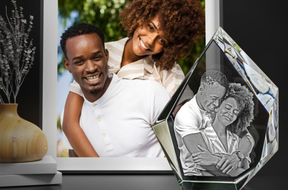 A married couple displays a 3D Photo Crystal in their new home.