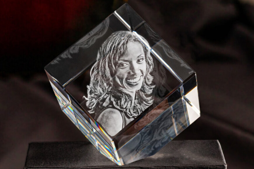 A personalized crystal gift with a 3D photo of the birthday girl inside.