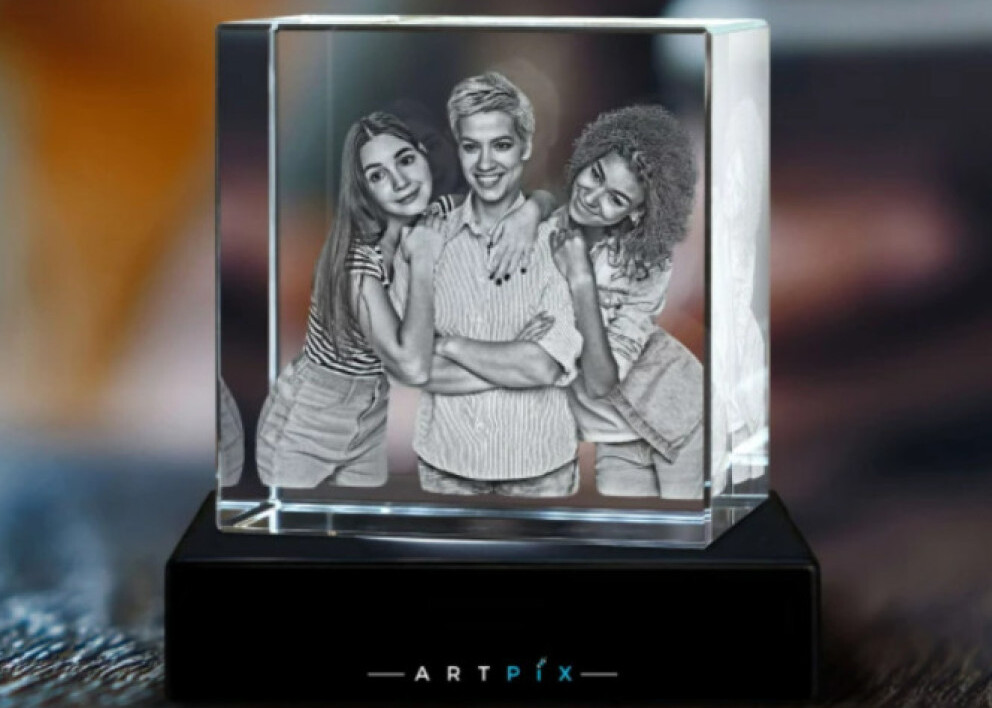 A personalized crystal gift engraved with a 3D photo of three friends.