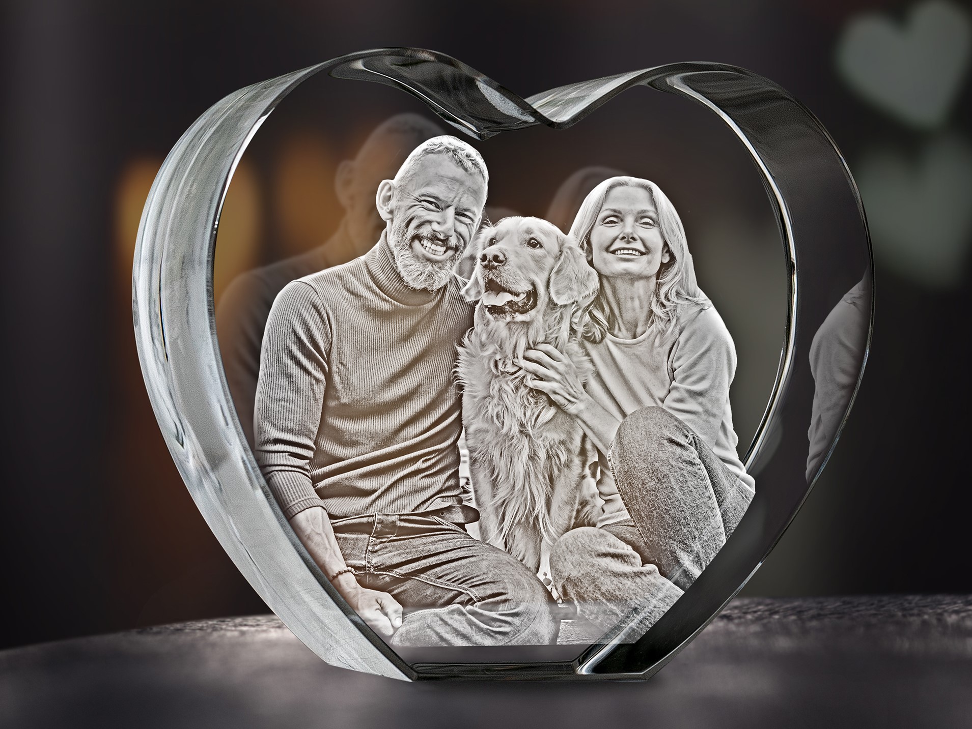 A sweet family photo engraved inside a heart-shaped crystal makes a lovely gift.