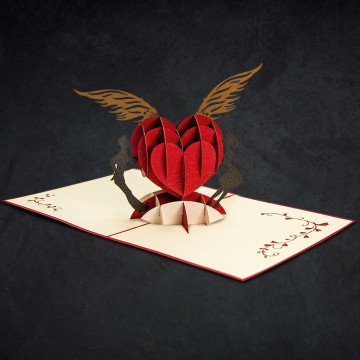 Sweetheart Couple Greeting Card An open Sweetheart Couple Greeting Card with a pop-up heart inside