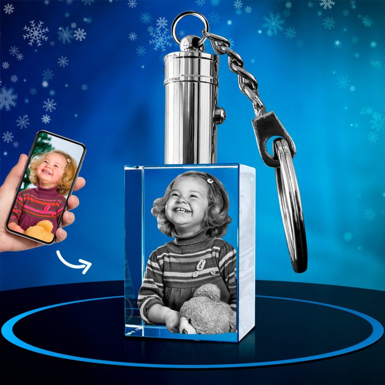 A photo of a daughter engraved inside a Keychain Rectangle. Xmas.