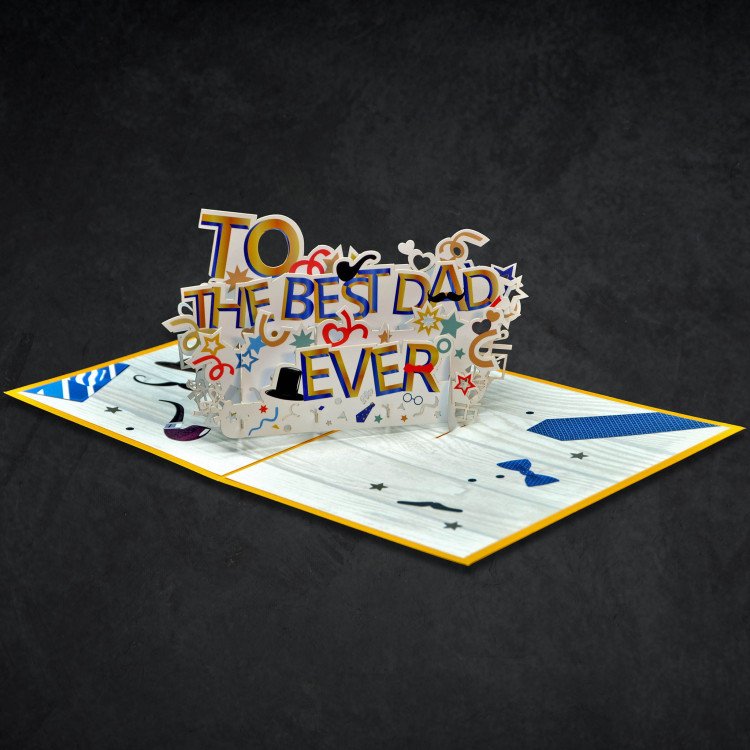 An open Father’s Day Card with a pop-up greeting that says “To the Best Dad Ever” inside
